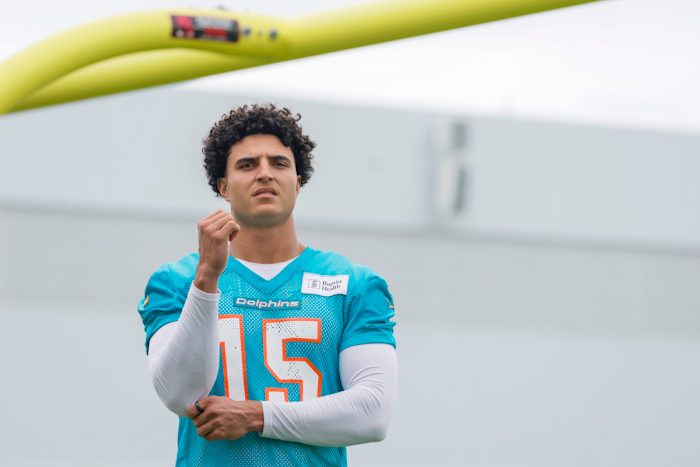 Miami Dolphins linebacker Jaelan Phillips looks on with his helmet off